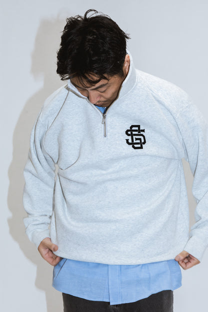 SG EMBLEM QUARTER ZIP SWEATSHIRT